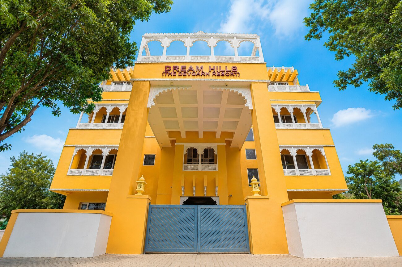 The grand lit entrance of the resort