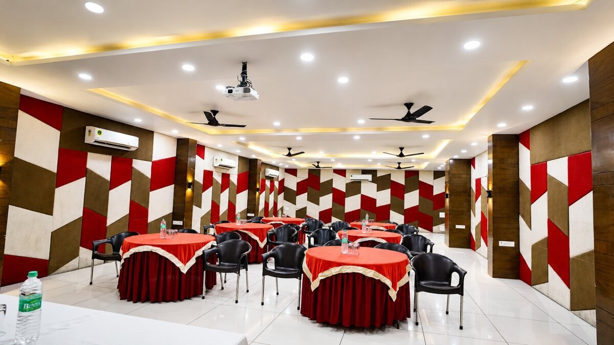 A banquet hall set with tables and décor for a function