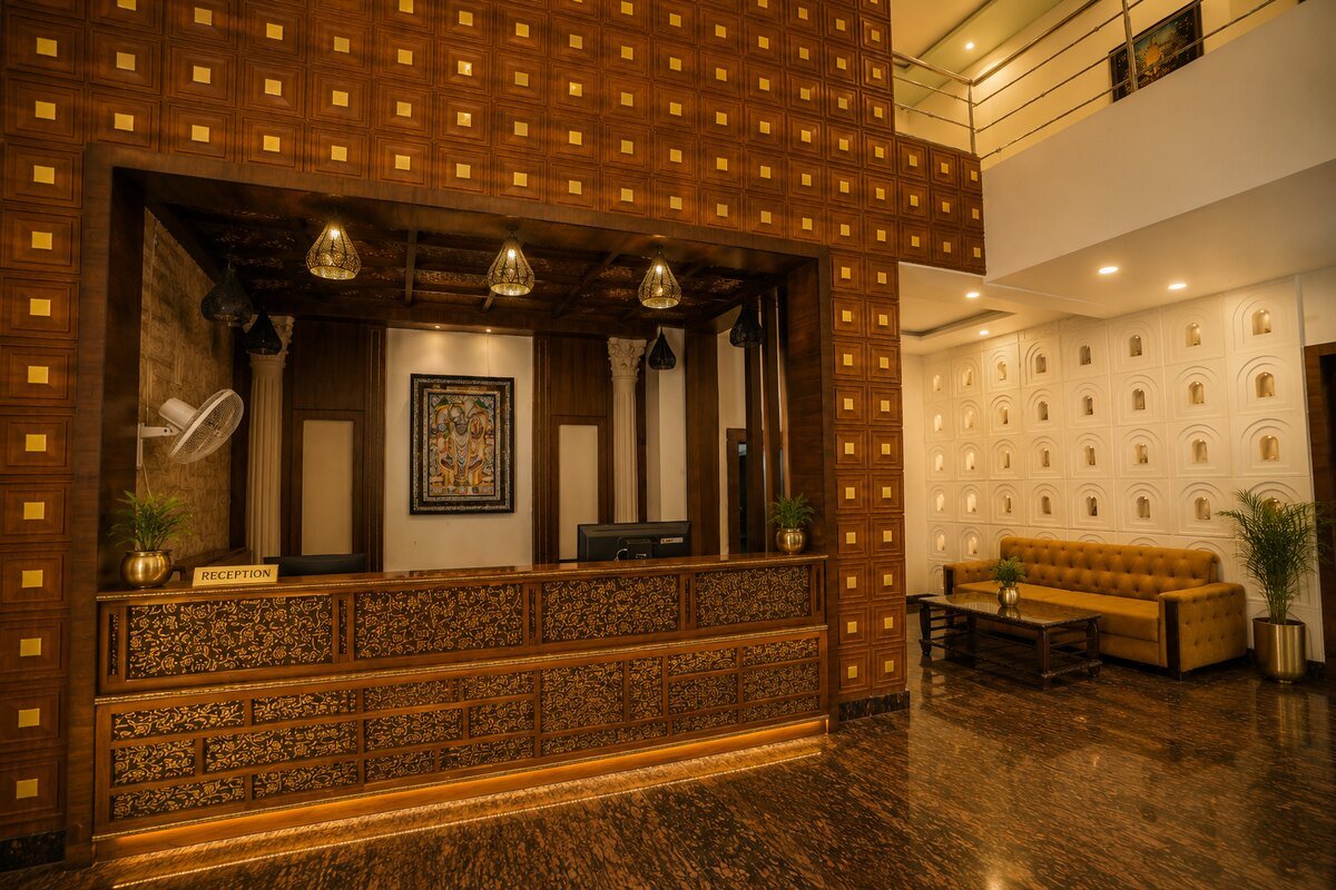The reception desk with carved wood decor