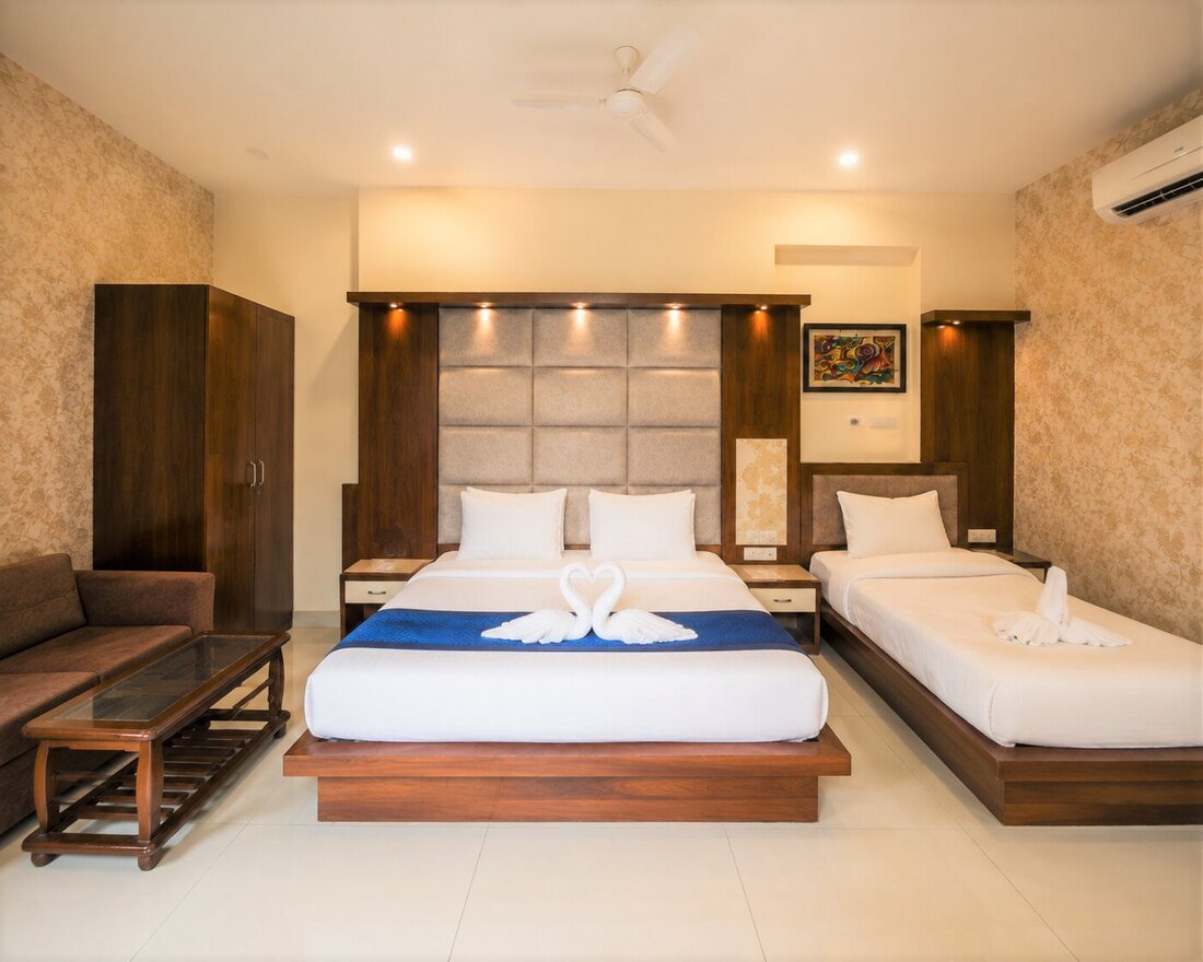Premium Triple balcony room with wood panelling and seating
