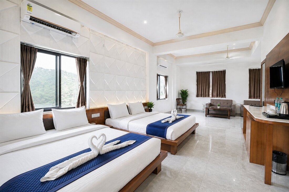 Comfort Family Room interior with two beds and TV